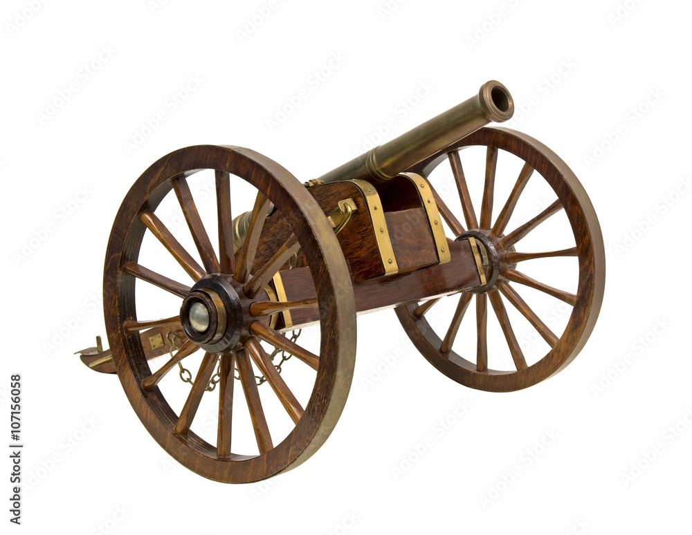 Vintage wooden cannon isolated over white
