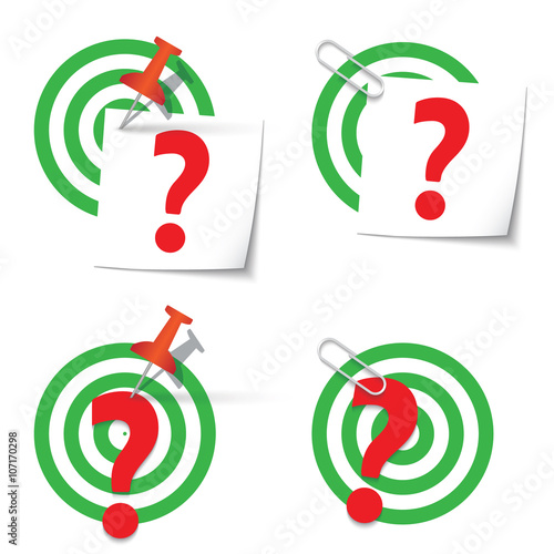 Four targets and thumbtack and paper clip