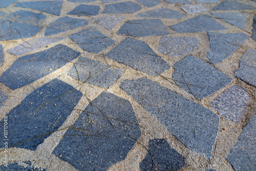 Modern paving tile made of cracked stones