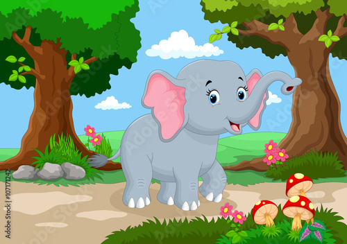 Fototapeta Naklejka Na Ścianę i Meble -  Funny elephant with a background of a beautiful garden