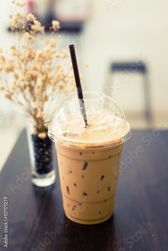 Iced coffee on wood table add retro color