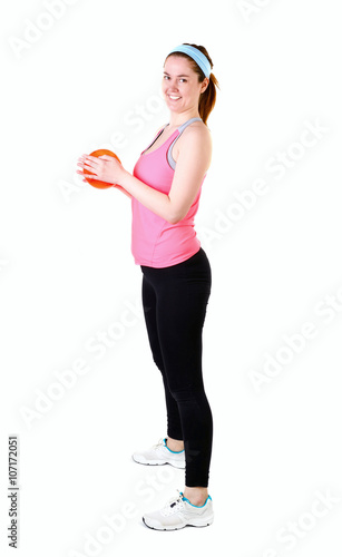 Sporty woman fitness workout with small ball, isolated on a white background