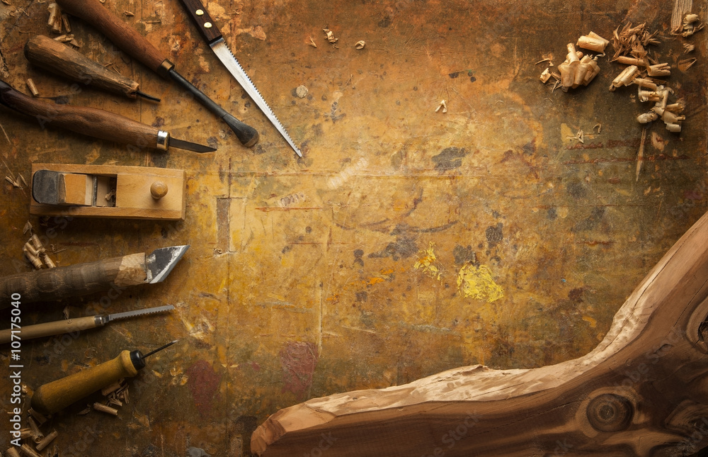 Hand tools Wood on an old wooden workbench Hand tools Wood on an old wooden workbench