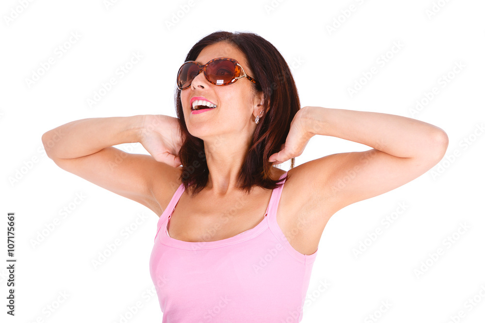 Portrait of trendy happy girl with sunglasses in pink t-shirt, white isolated background