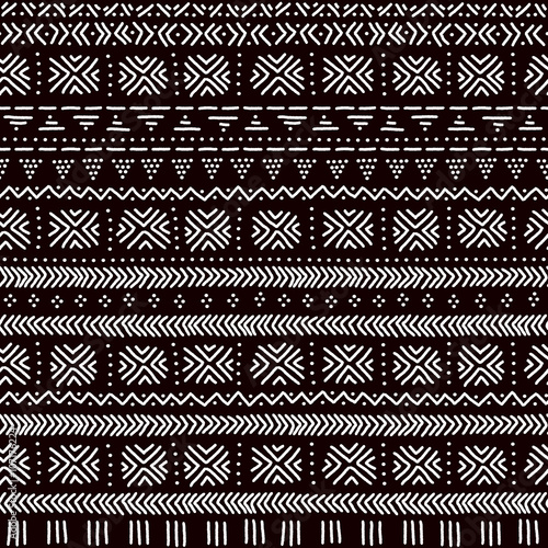 Black and white striped ornament traditional african mudcloth fabric seamless pattern, vector