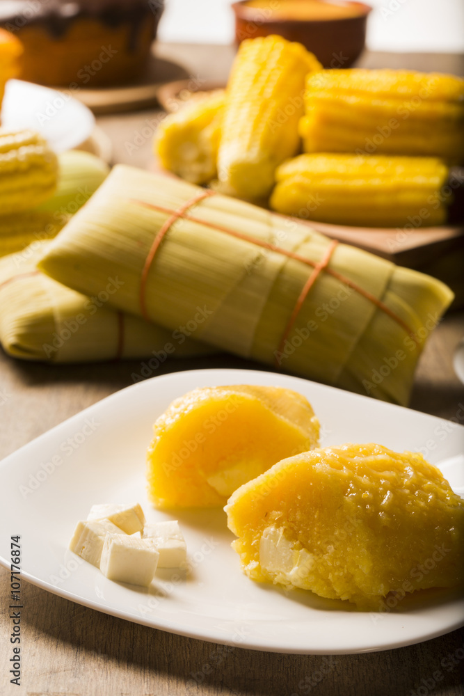 Pamonha with cheese - typical food of green corn - tasty and che Pamonha with cheese - typical food of green corn - tasty and che