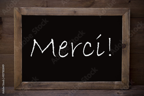 Chalkboard With Merci Means Thank You