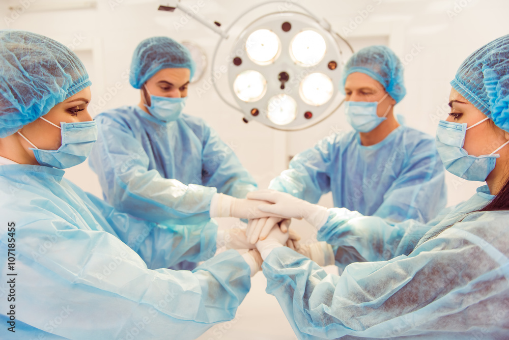 Team surgeons at work Team surgeons at work