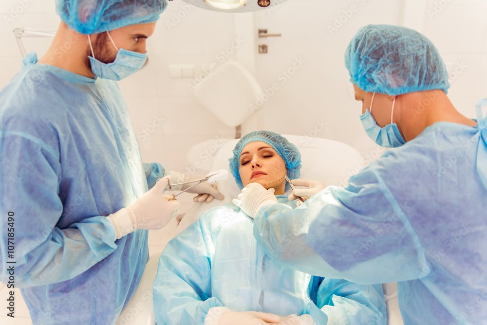 Team surgeons at work Team surgeons at work