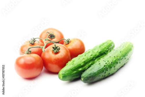 Red tomatoes and green cucumbers
