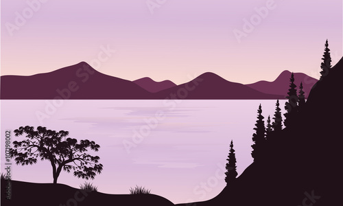 Silhouette of sea and mountain photo