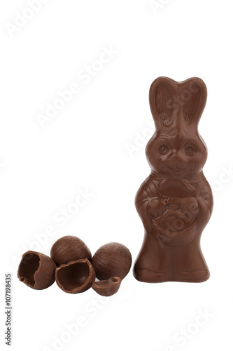chocolate bunny candy beside the chocolate eggs