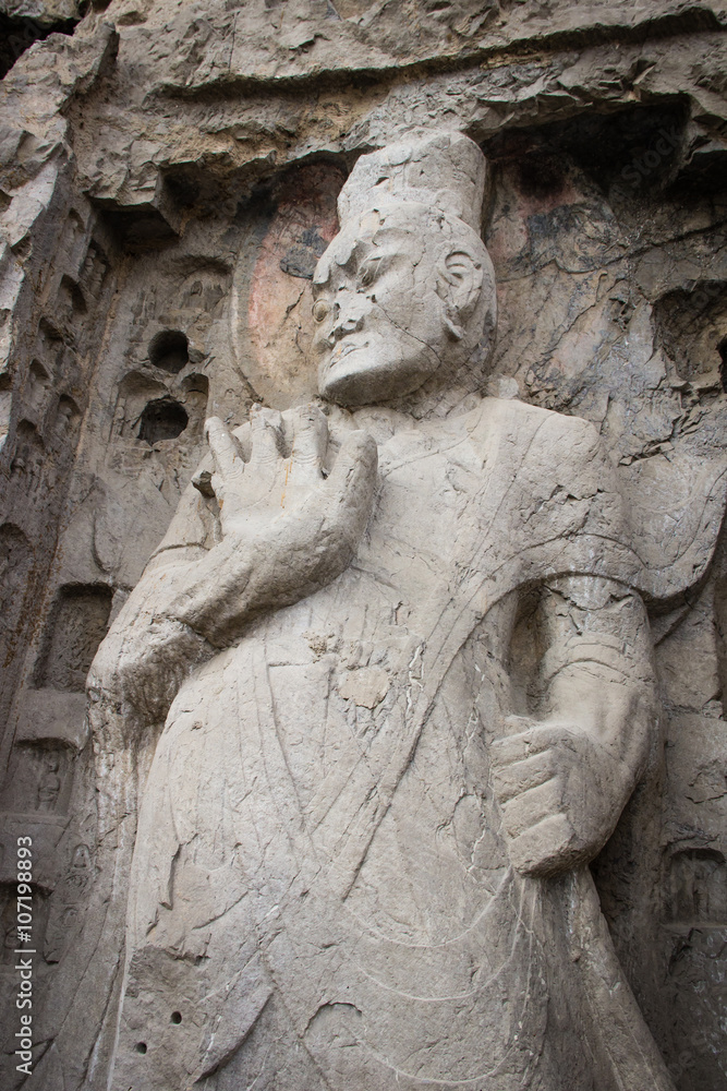 Porter's statue rock carving at Longmen Grottoes, Luoyang , Hena