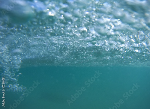 abstract underwater scene with air bubbles under water