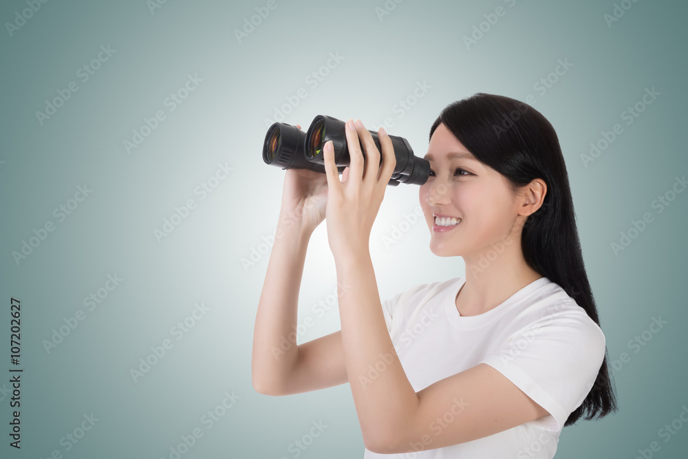 woman using binoculars woman using binoculars