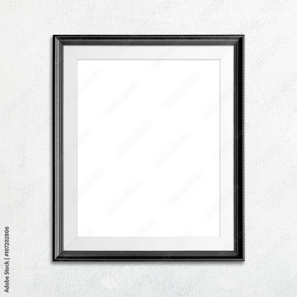 Black picture frame on white wall. Black picture frame on white wall.