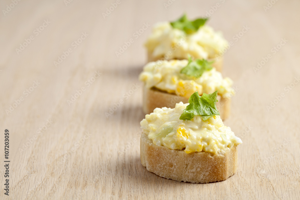 in lined egg sandwich with leafs in lined egg sandwich with leafs