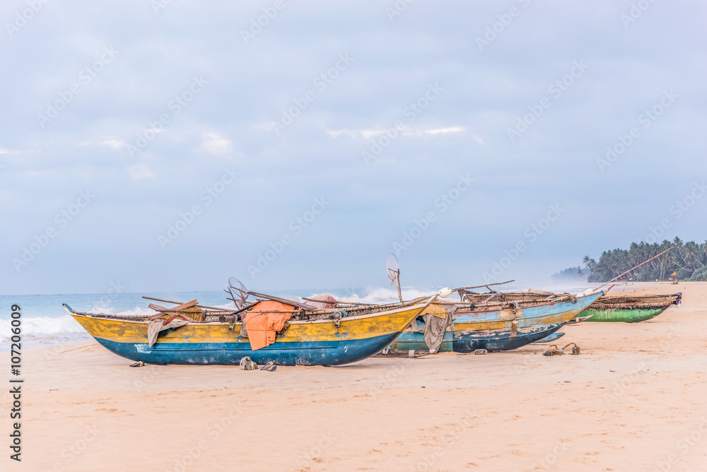 Tropical seascape with a boats on the beach