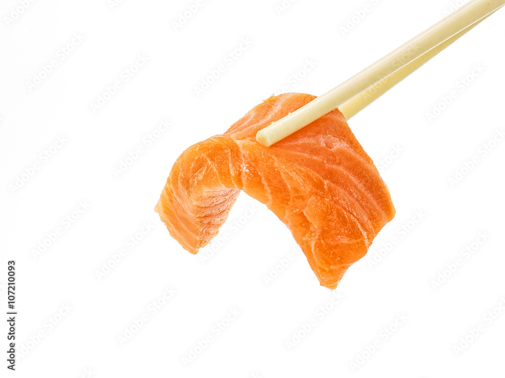 Salmon sushi with chopsticks shot on white Salmon sushi with chopsticks shot on white