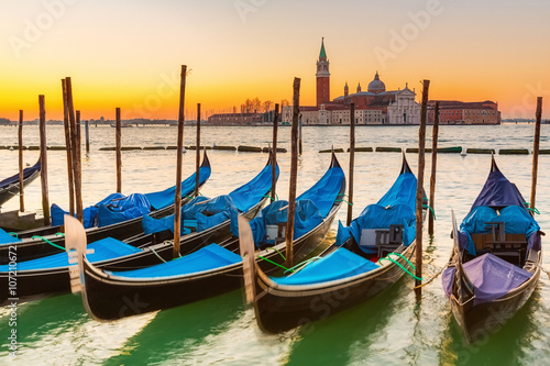 Gondolas in Venice at sunrise © sborisov