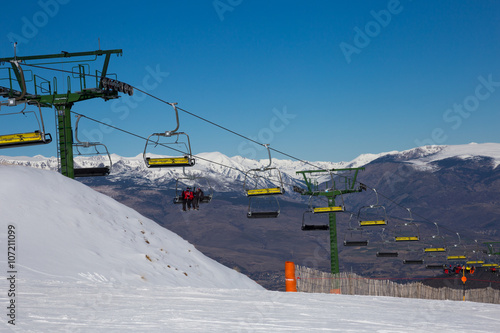 Chair ski lifts in La Molina, Spain photo