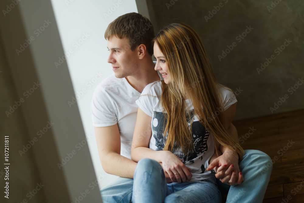 romantic happy young couple relax at modern home indoors romantic happy young couple relax at modern home indoors