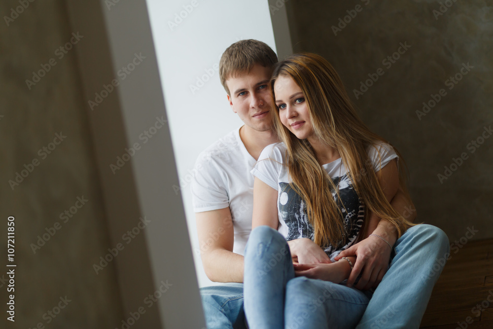 romantic happy young couple relax at modern home indoors romantic happy young couple relax at modern home indoors