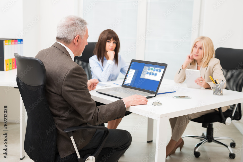 Fototapeta premium Business people at work in their office