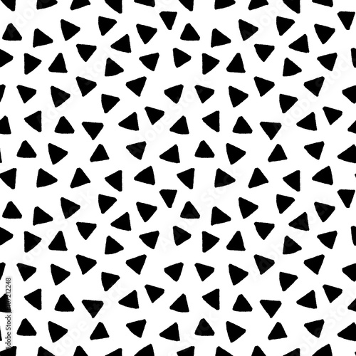 Black and white triangles hand drawn simple geometric seamless pattern, vector