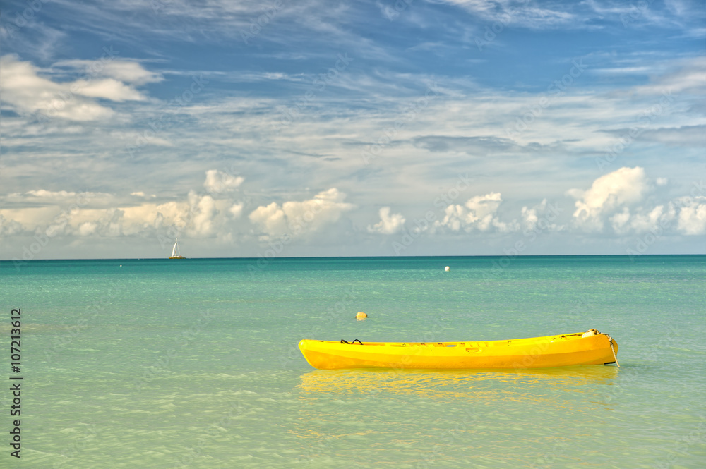 Yellow boat in sea Yellow boat in sea