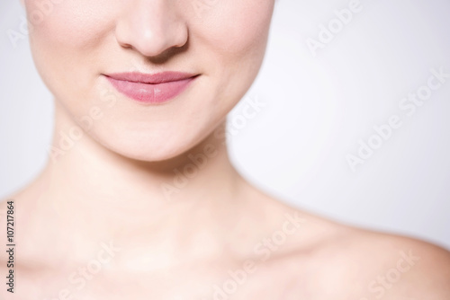 Close up shot of woman face and bare shoulders