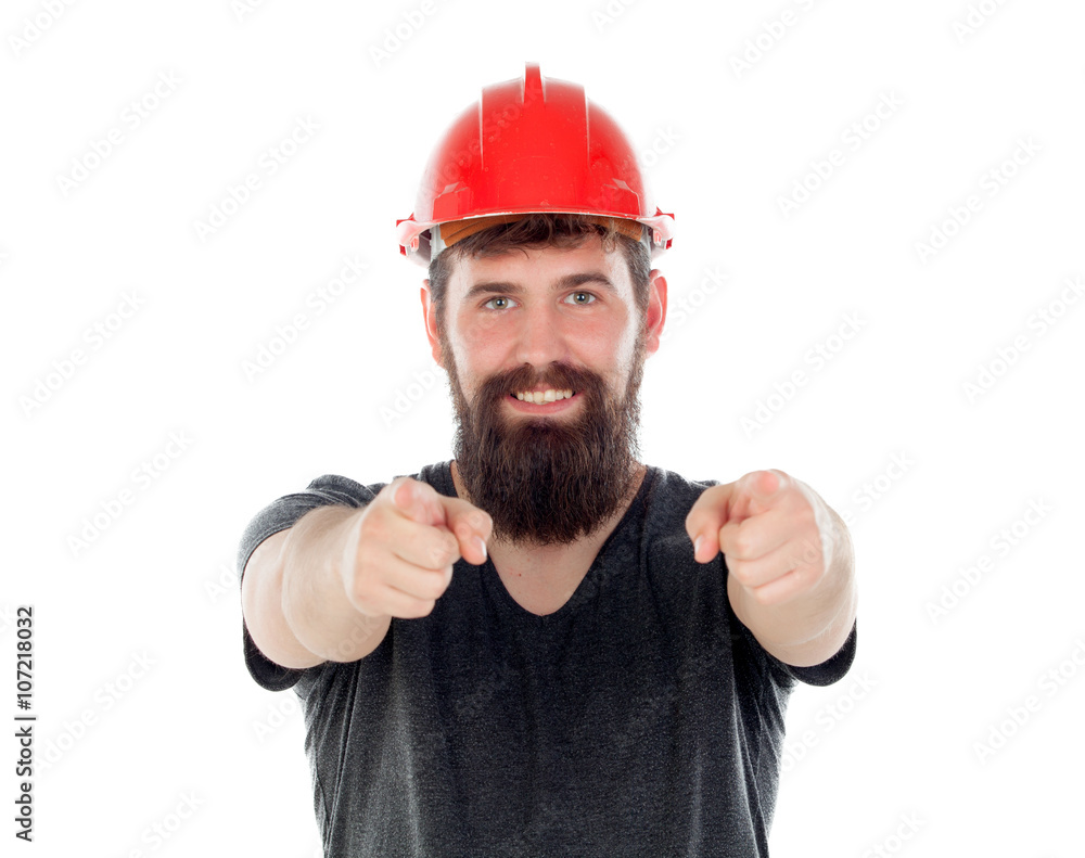 Young men with hipster look and red helmet pointing at camera Young men with hipster look and red helmet pointing at camera