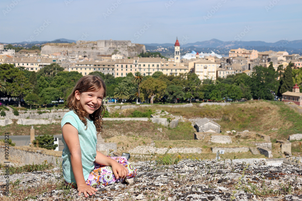 beautiful little girl on vacation Corfu town Greece