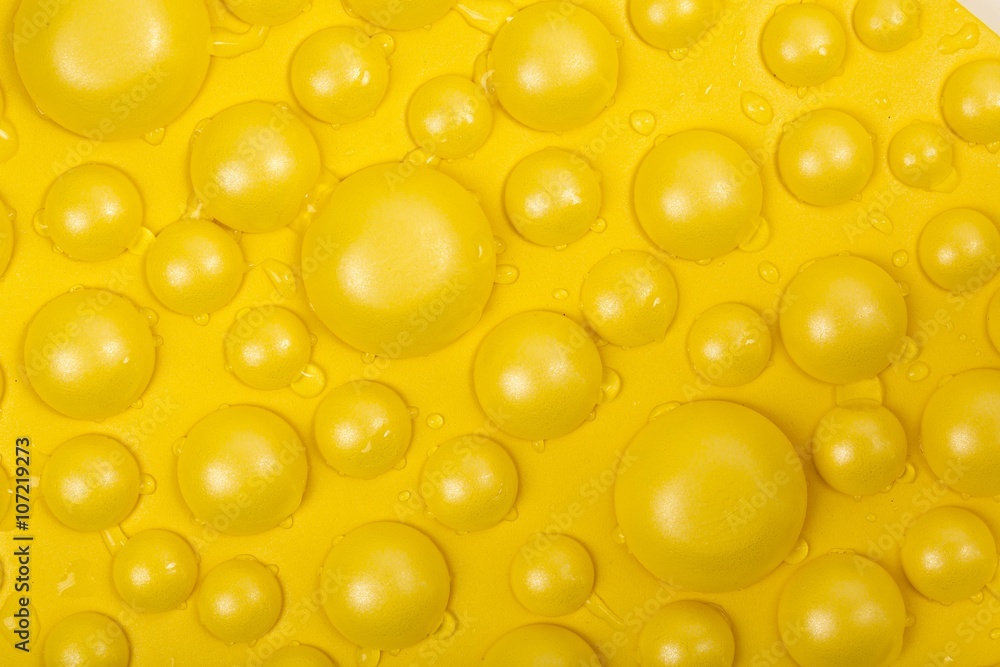 Yellow colored foam mat. Background Yellow colored foam mat. Background