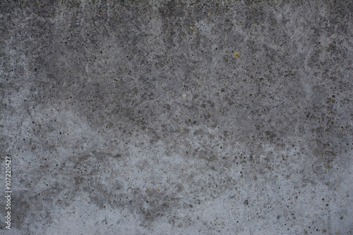Old concrete with decal and moss