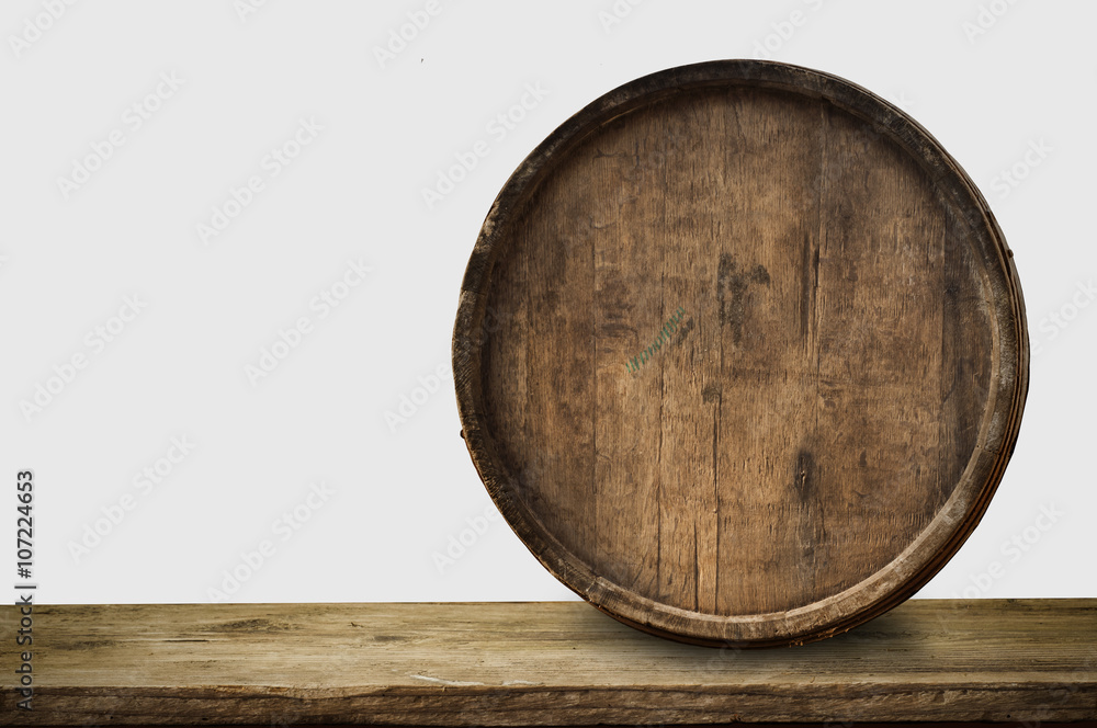 background barrel and worn old table of wood background barrel and worn old table of wood