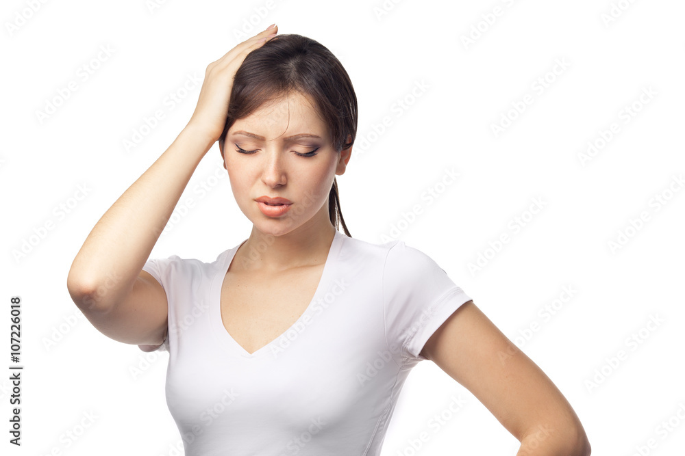Headache concept - young woman suffering a migraine Headache concept - young woman suffering a migraine