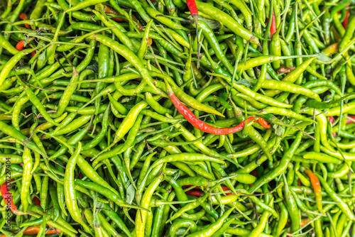 Red and green chillis background