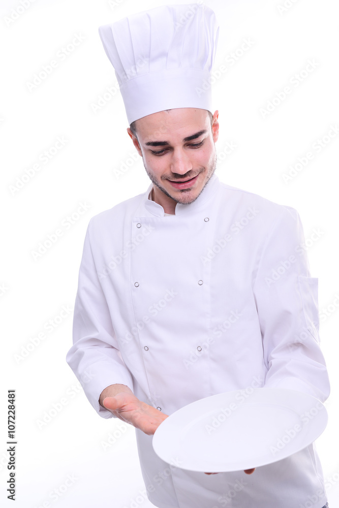 young cook chef isolated on white background holding proudly empty plate