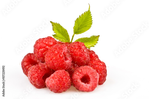 red ripe raspberry berry isolated on white