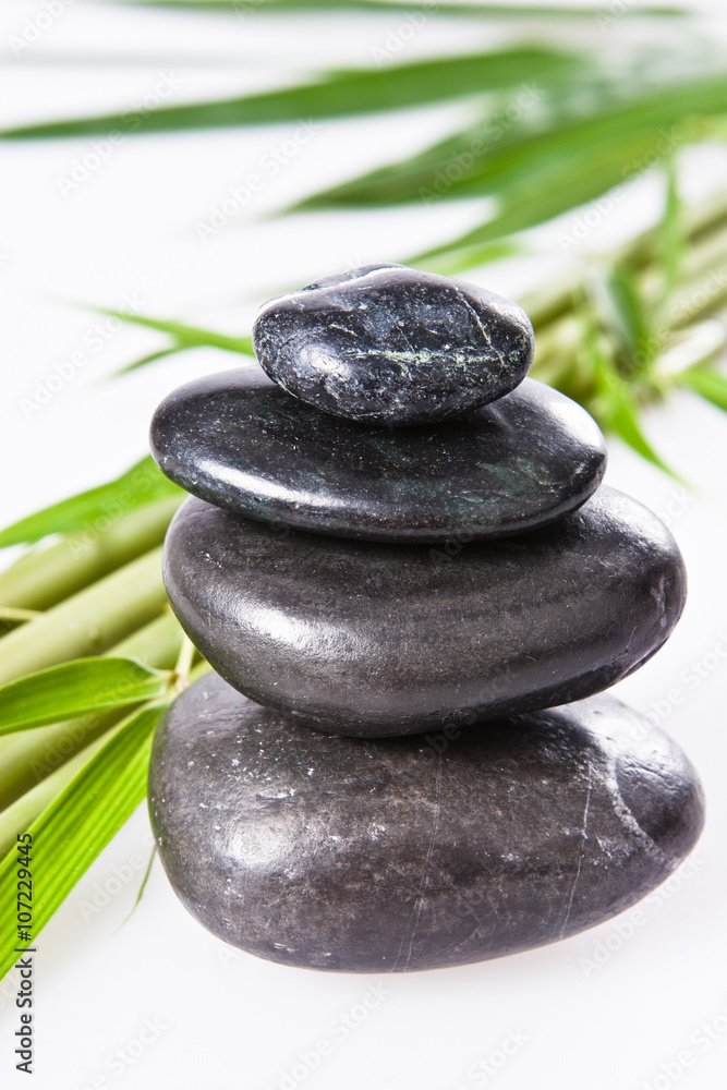 Fototapeta premium spa la stone health therapy pebbles stack isolated on white with bamboo