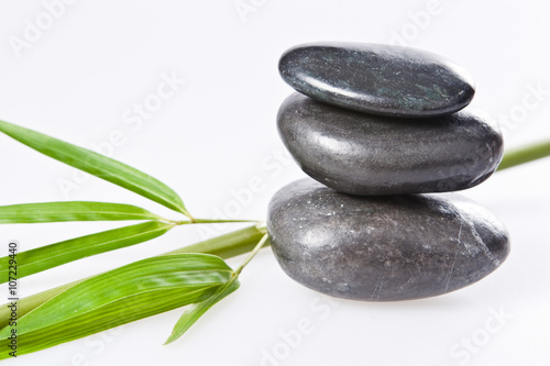 spa la stone health therapy pebbles stack isolated on white with bamboo