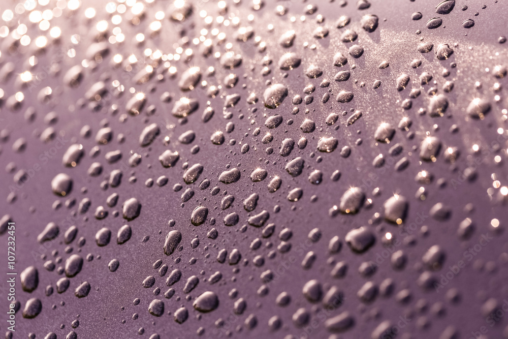 water drops on a metallic surface