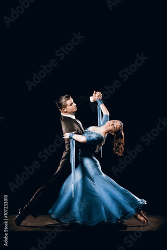 Fototapeta Dramatic Argentinean Dance Couple Competing in Tango Championships