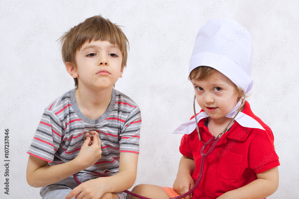 Two brothers play in doctor and patient Two brothers play in doctor and patient