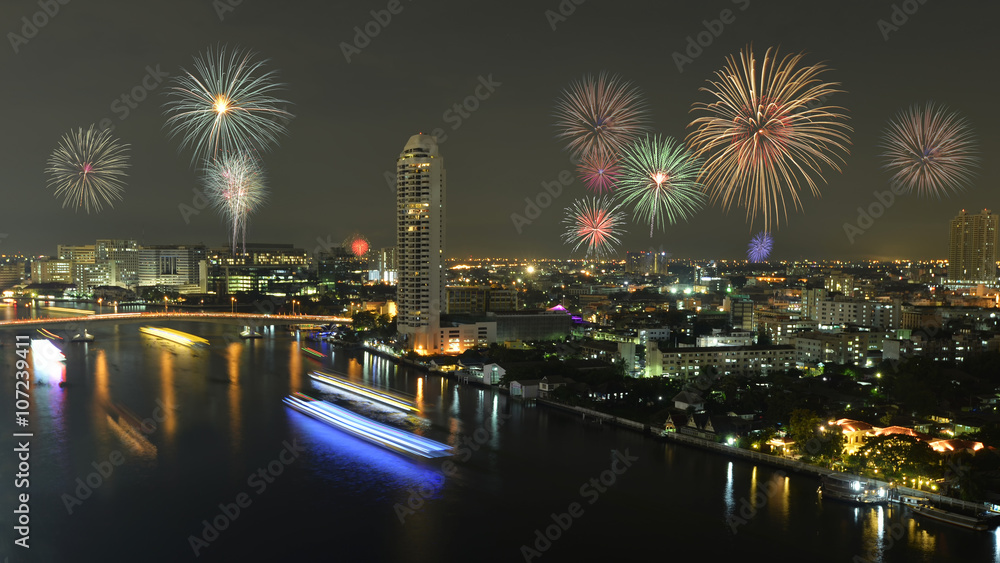 Beautiful firework display for celebration on the river ,Bangkok city in Thailand.