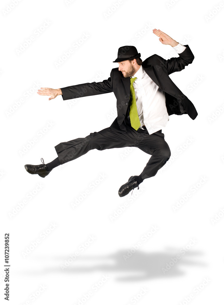 happy businessman with green tie jump isolated on white