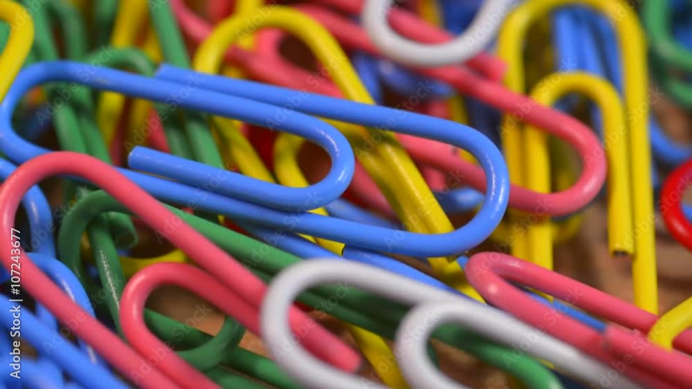 Track over color coated paper clips. Track over color coated paper clips.