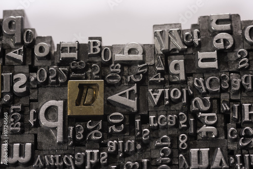 Metal Letterpress Types.
A background from many historic typographical letters in black and white with white background.
