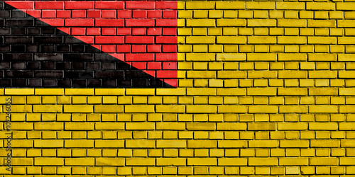 flag of Negeri Sembilan painted on brick wall photo